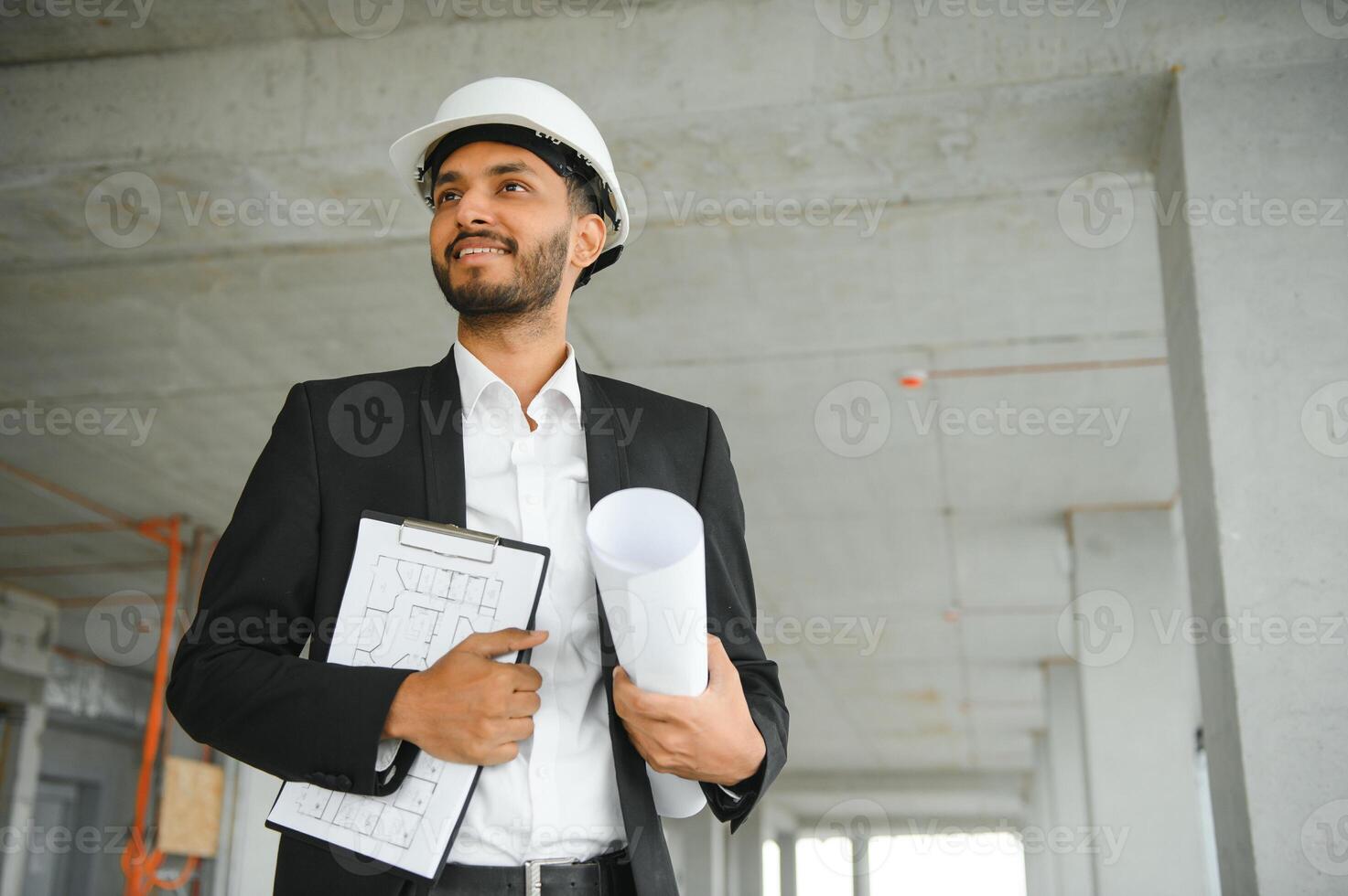Asian Engineer standing on site construction posting confident , Engineer construction happy job success with in target planning photo