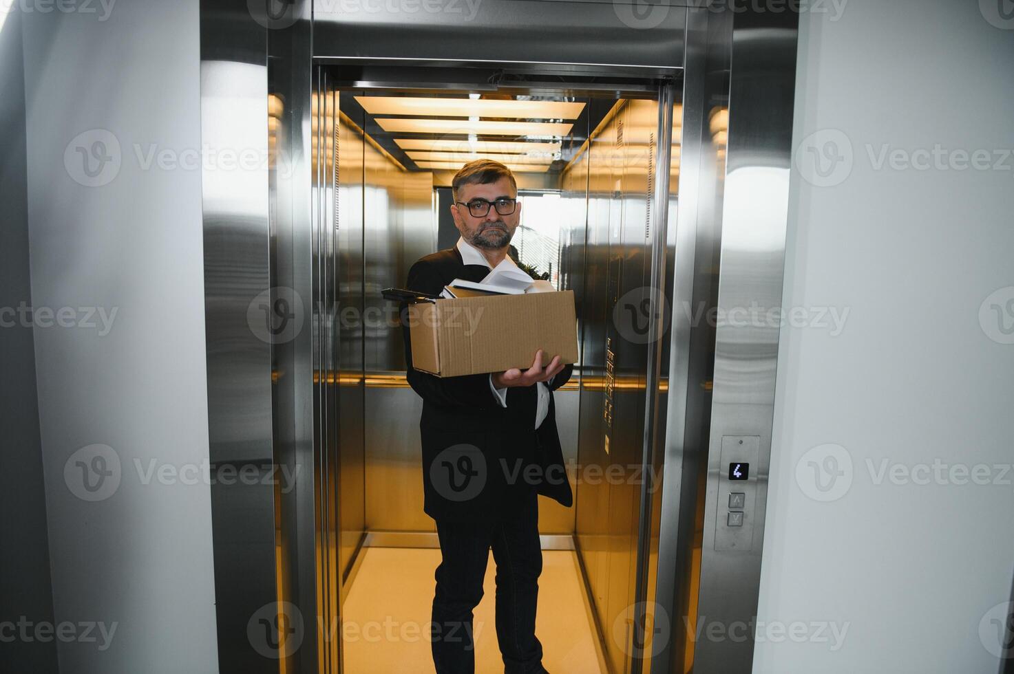 Old male employee in dismissal concept photo