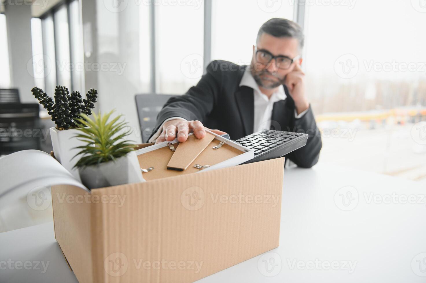 Old businessman employee in relocation concept photo