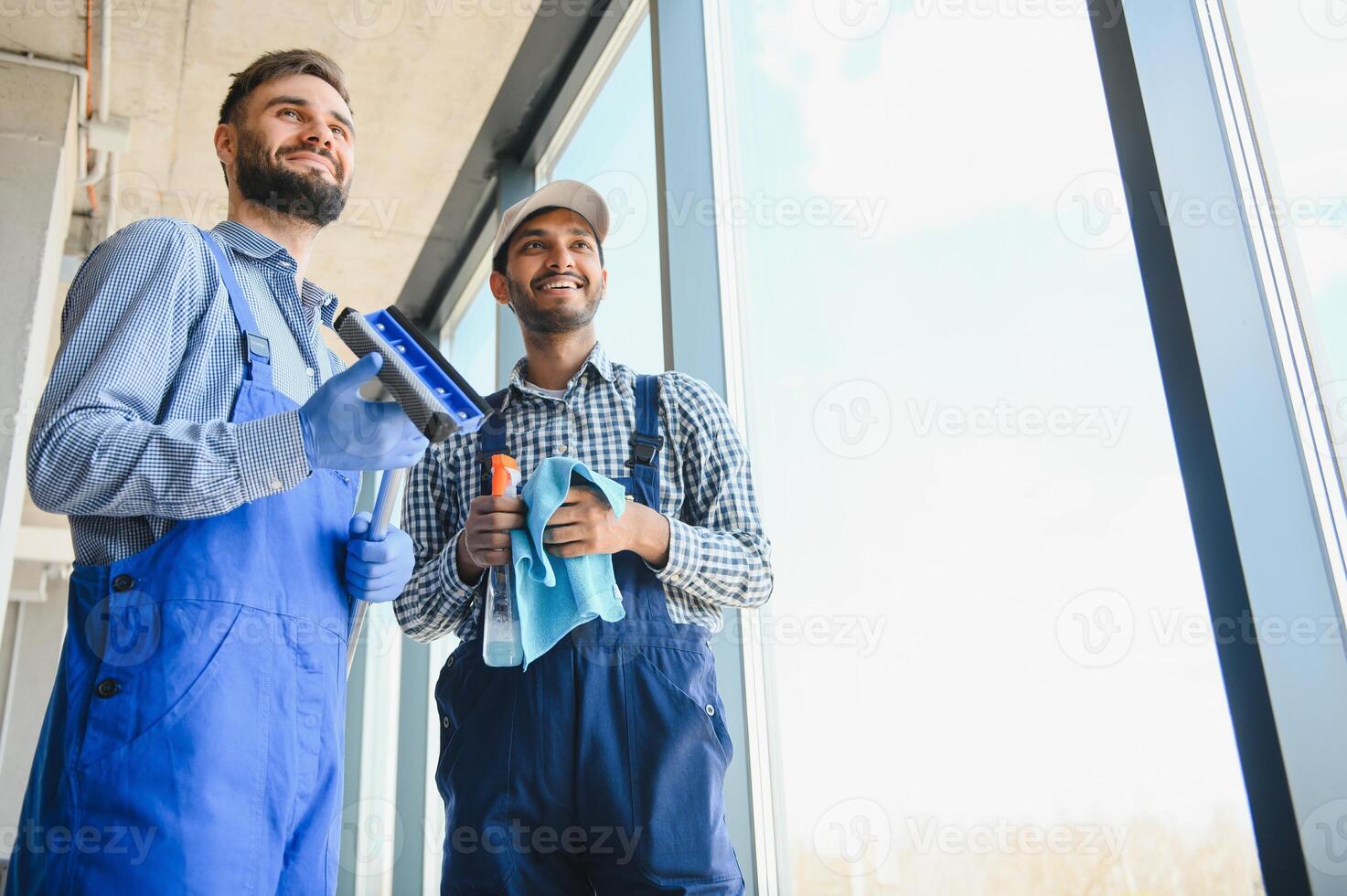 A man cleaning windows. cleaning team of men washes the windows photo
