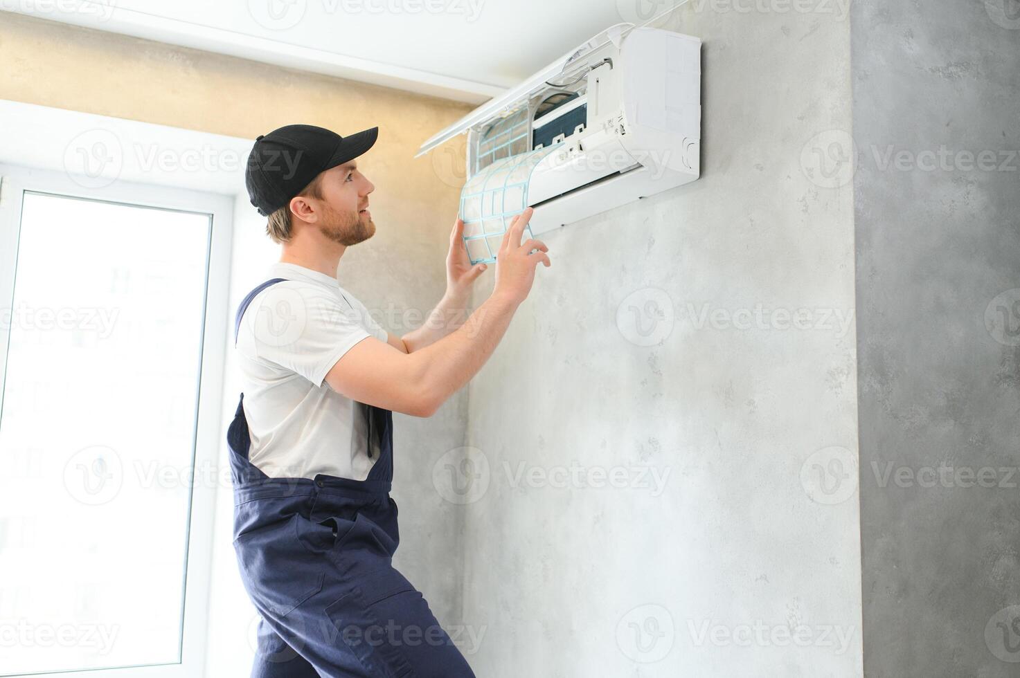 man hand hold air conditioner filter cleaning concept photo