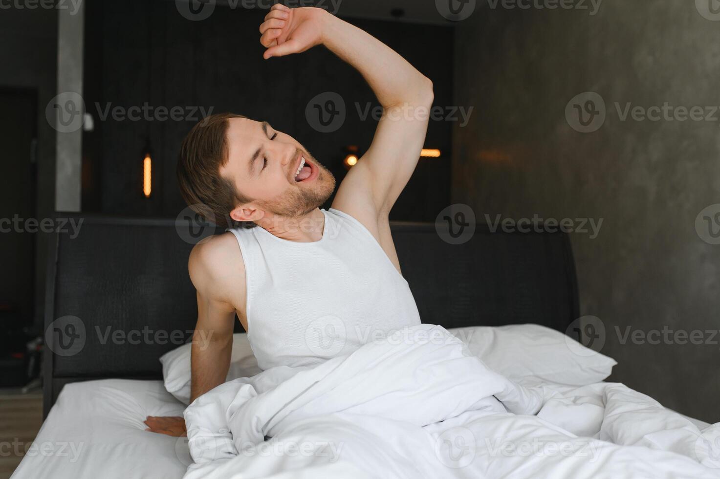 Carefree guy enjoying new day photo
