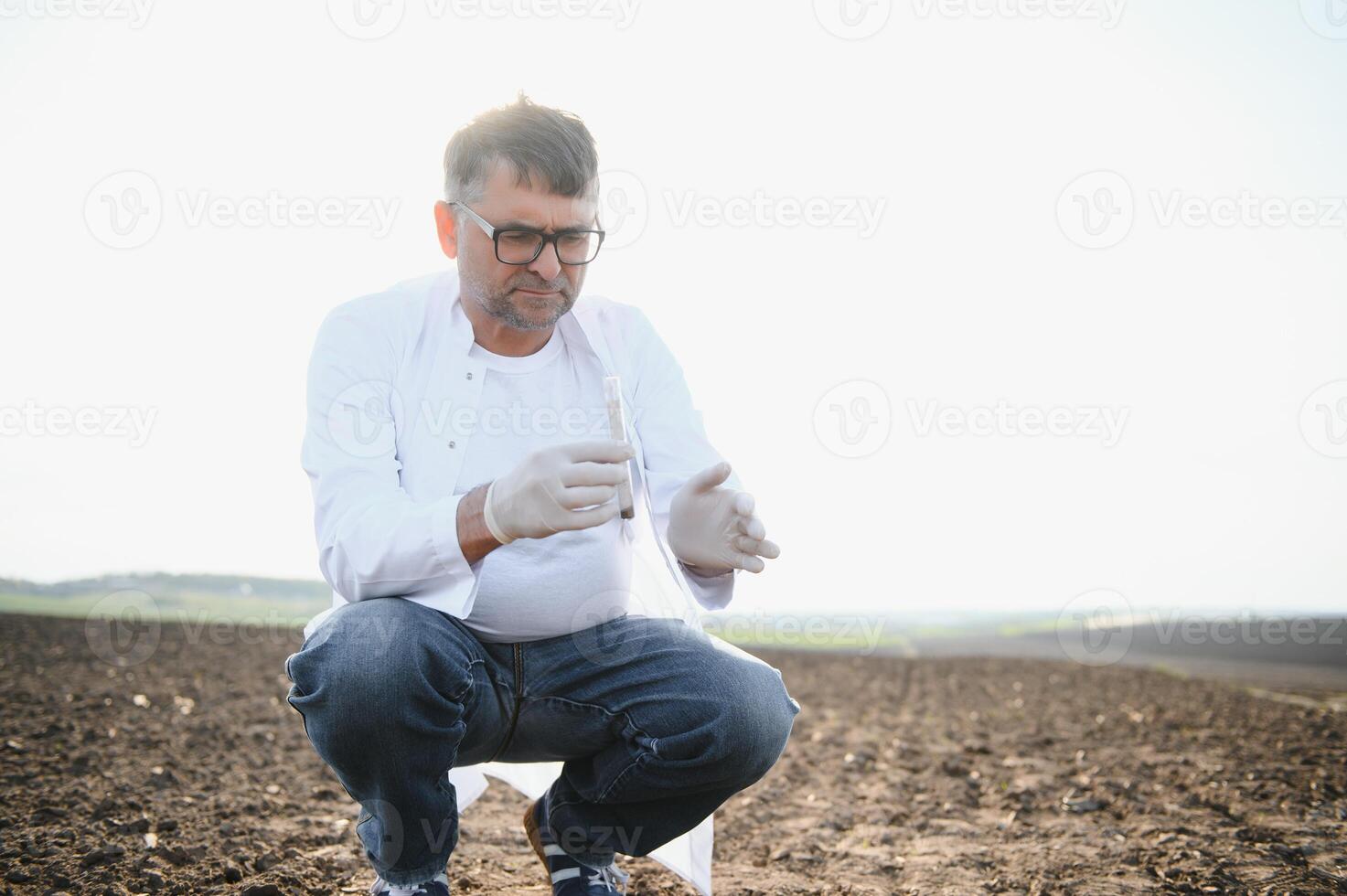 POV view of farmer owner control soil quality before seed plant. Future agriculture concept. photo