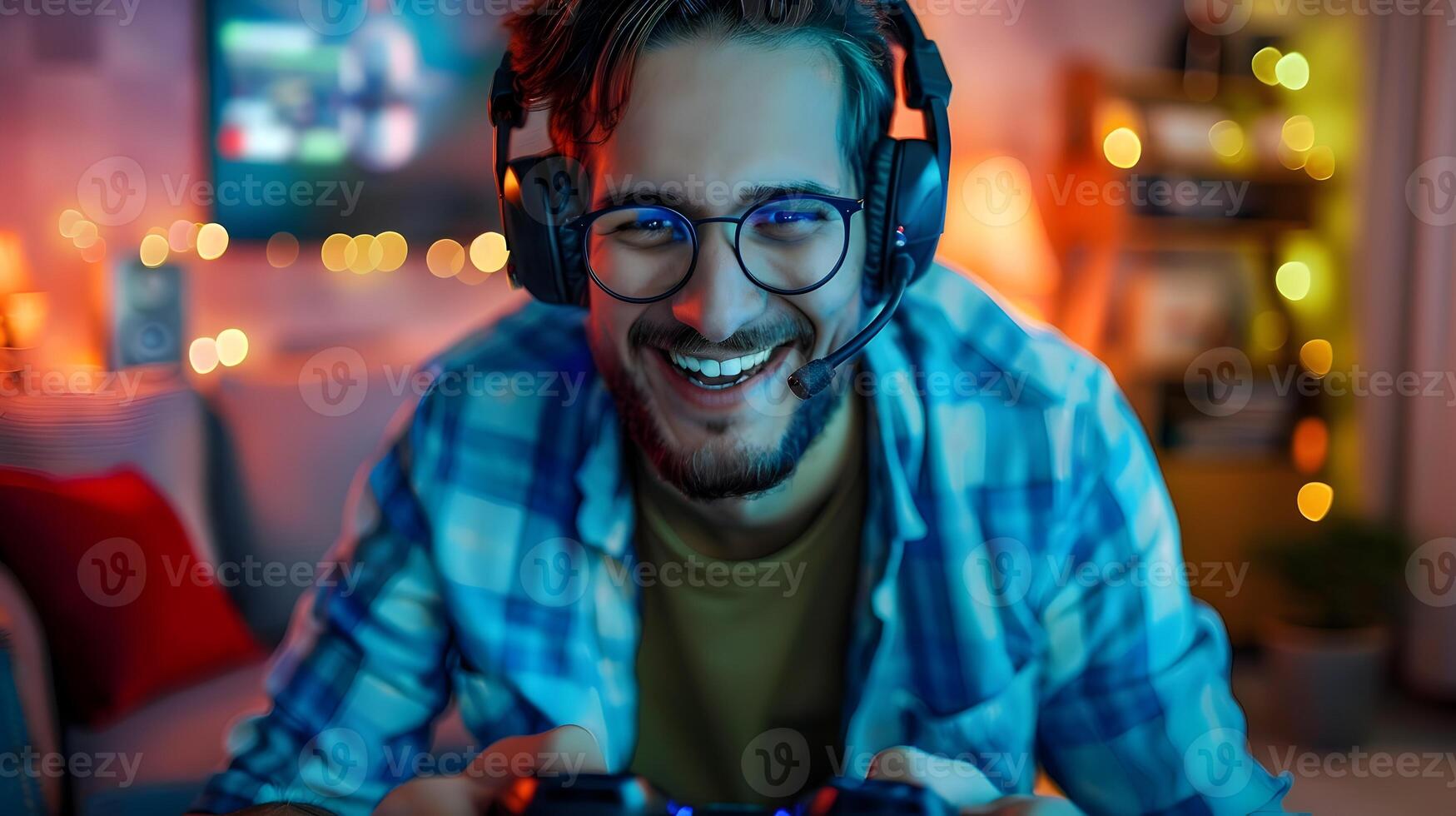 Delighted Gamer Enjoying Relaxed Evening with Gaming Setup photo