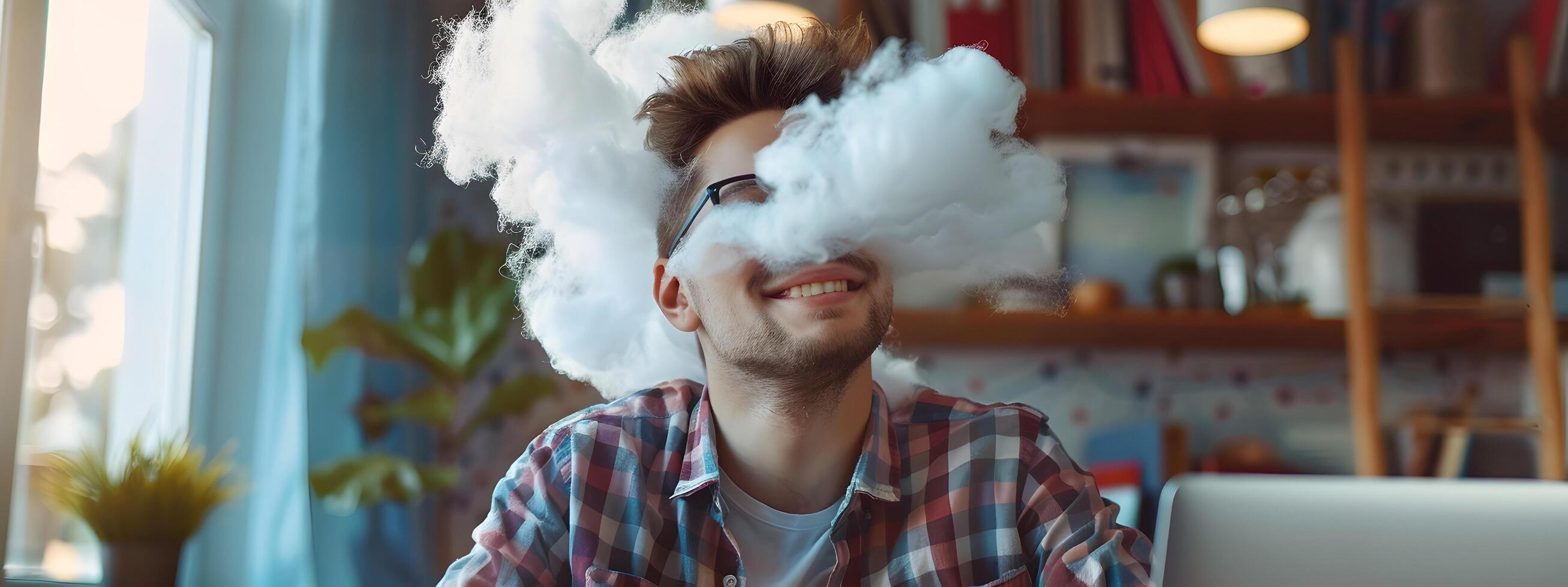 Millennial Vape Cloud Architect Relaxing and Working on Laptop in Modern Office photo