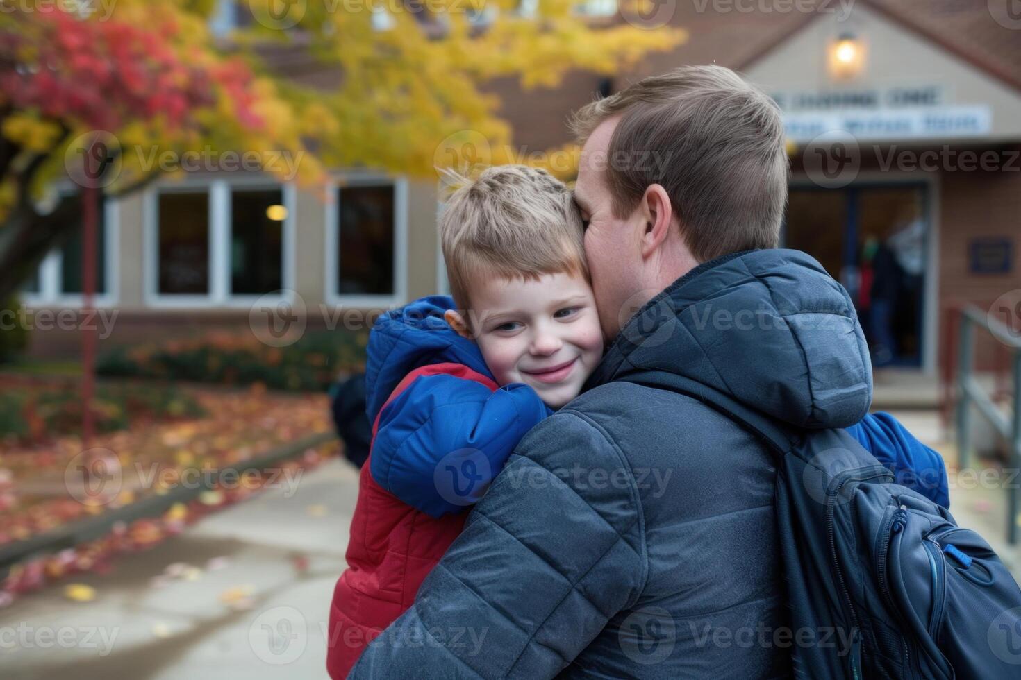 Heartwarming moment as a father hugs his son at the kindergarten entrance, showcasing a bond of love and support on a new educational journey photo