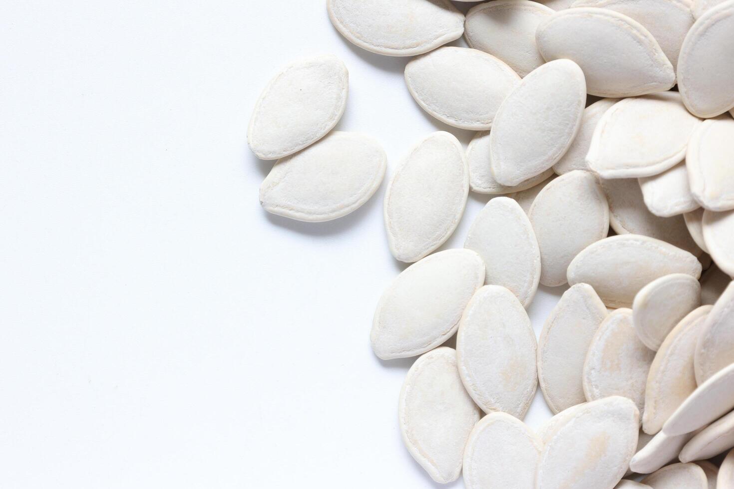 Top view of pumpkin seeds pattern texture background photo