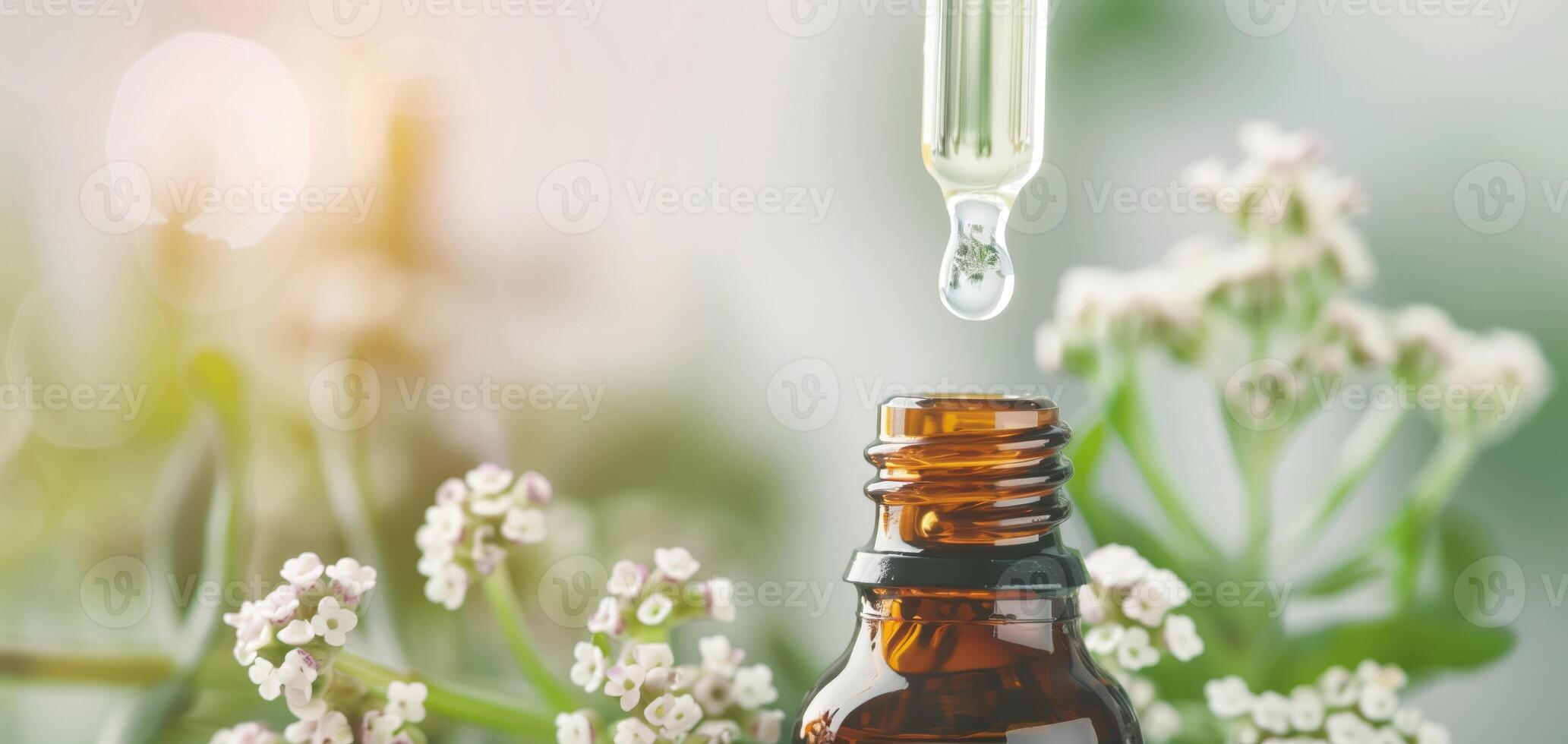 Close-up of a dropper placing essential oils into an amber bottle, with delicate white flowers in the background, suggesting natural aromatherapy. photo