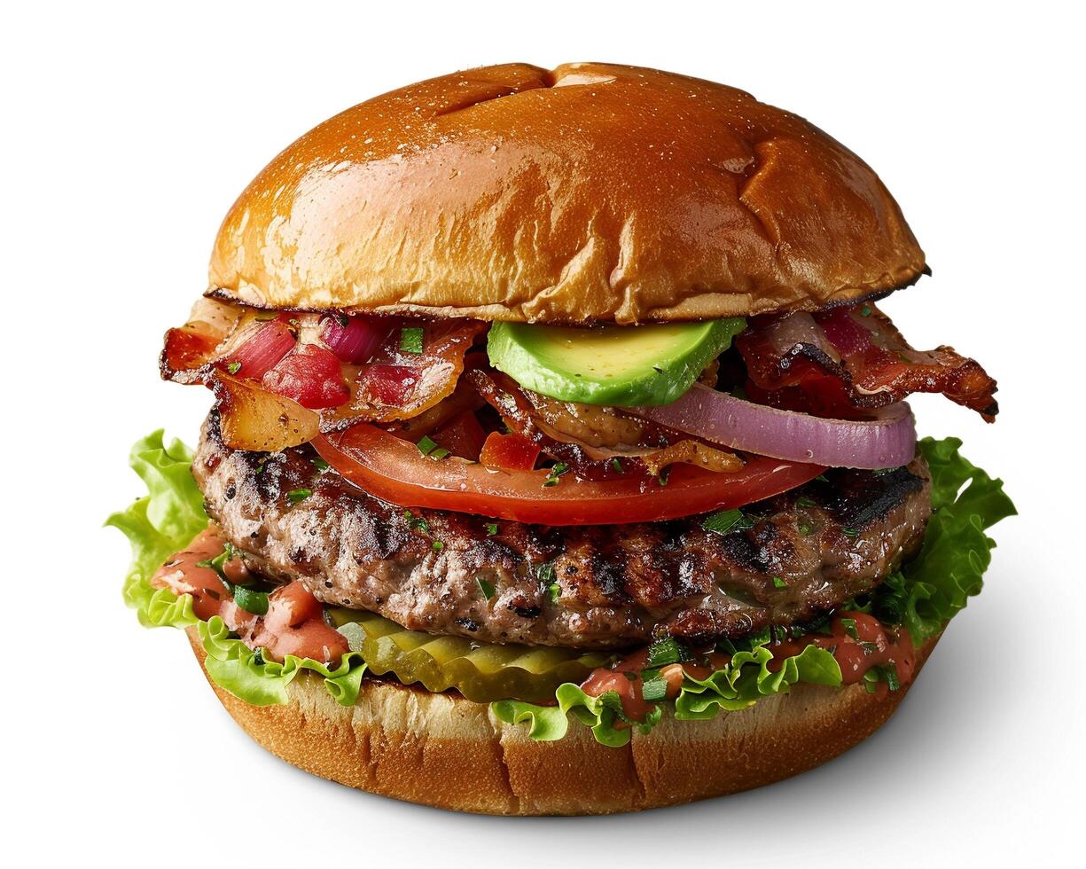 a hamburger with bacon, lettuce, tomato and avocado photo