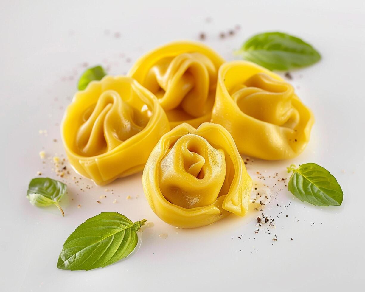 three ravioli with cheese and herbs on a white plate photo