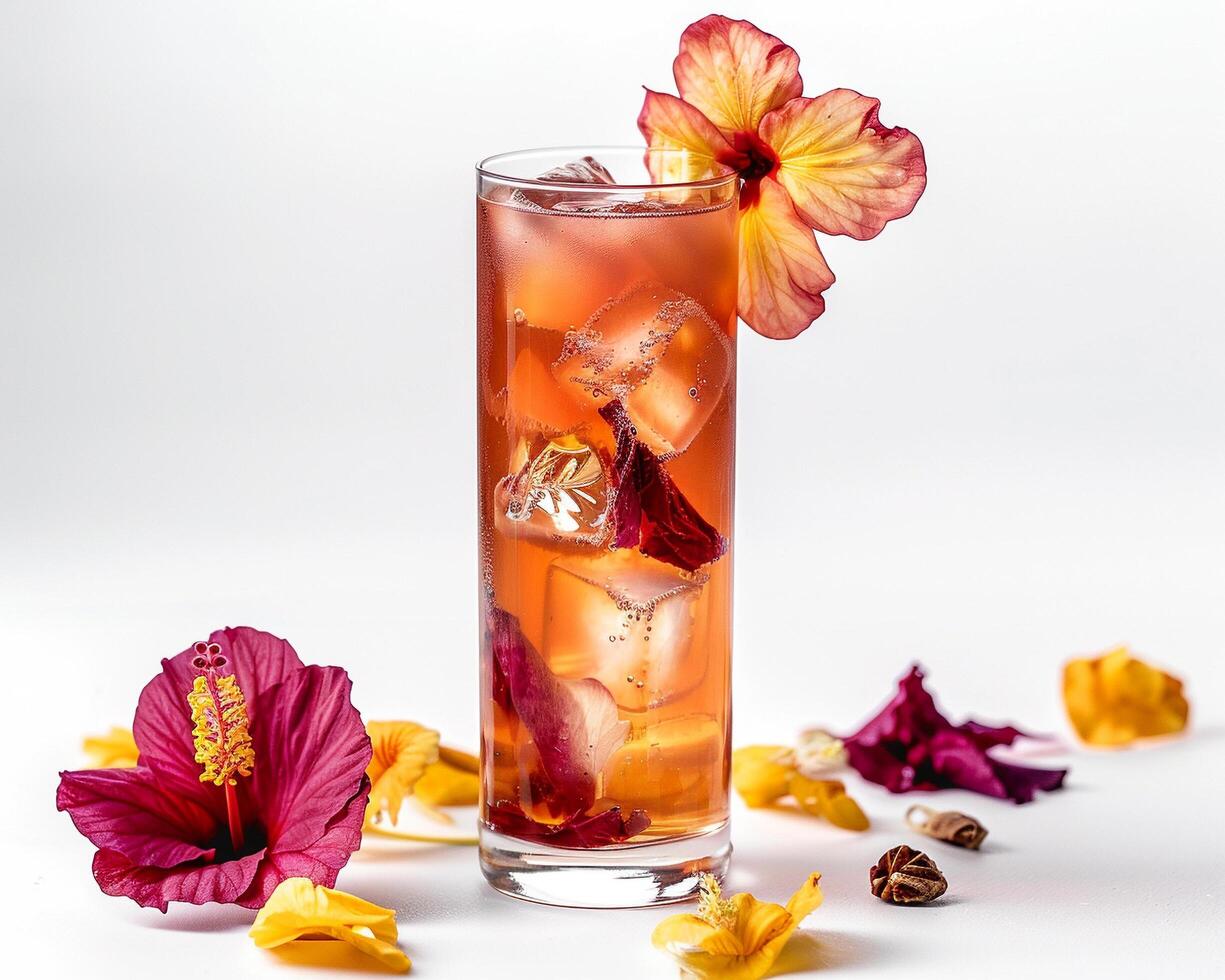 a glass of iced tea with flowers and ice photo