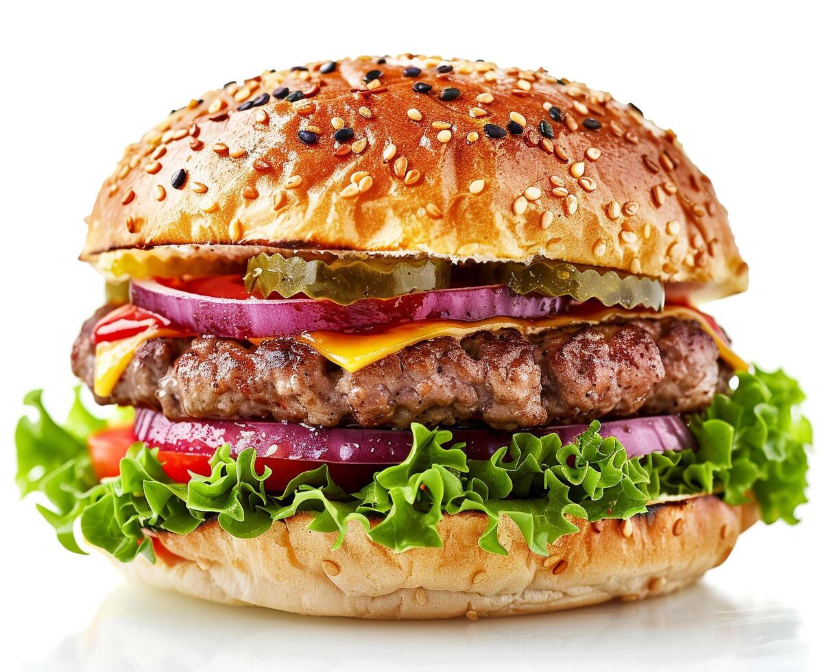 a hamburger with lettuce, tomato, onion and pickles photo