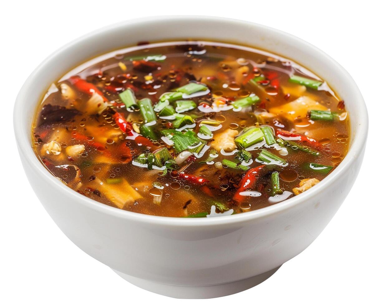 a bowl of soup with green onions and other ingredients photo