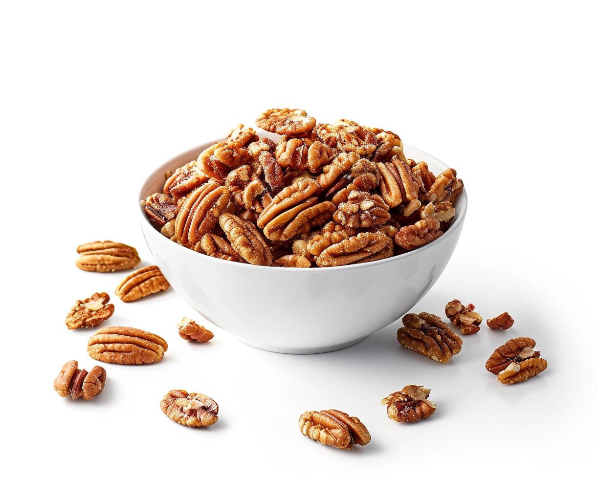 a bowl of pecans on a white background photo