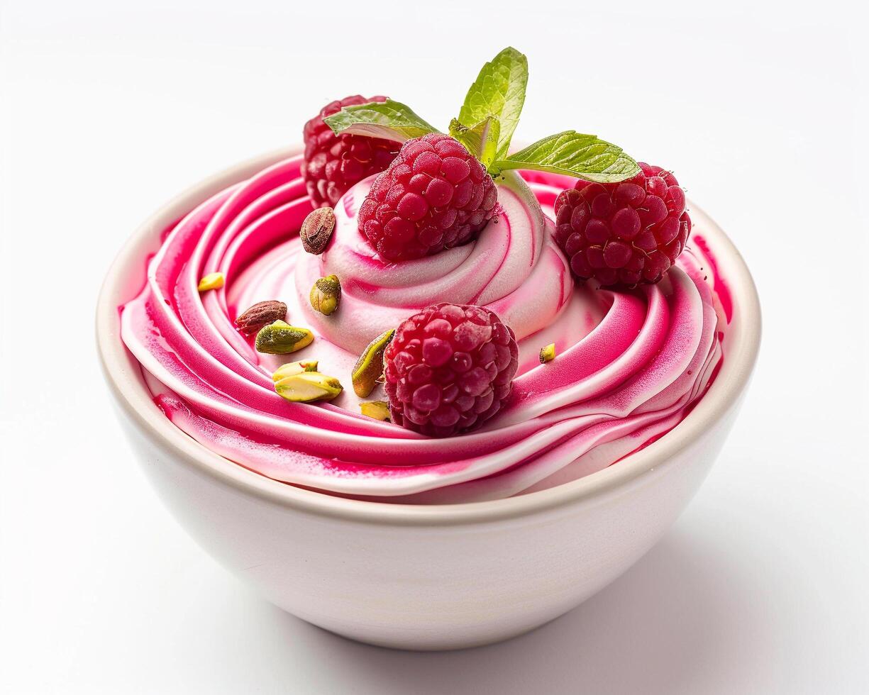 a bowl of pink yogurt topped with raspberries photo