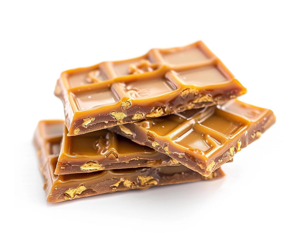 a pile of caramel candy on a photo
