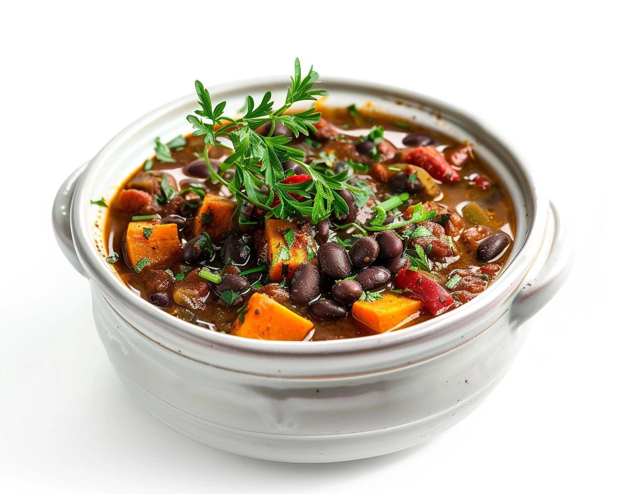 A Bowl of Black Bean and Sweet Potato Soup with a Sprig of Thyme photo