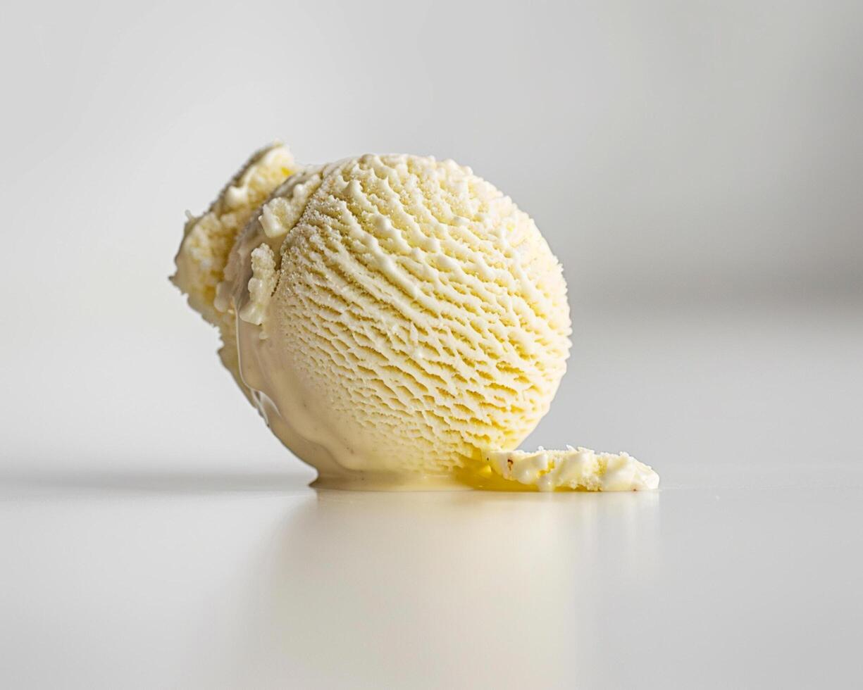 a single ice cream scone is shown on a white surface photo