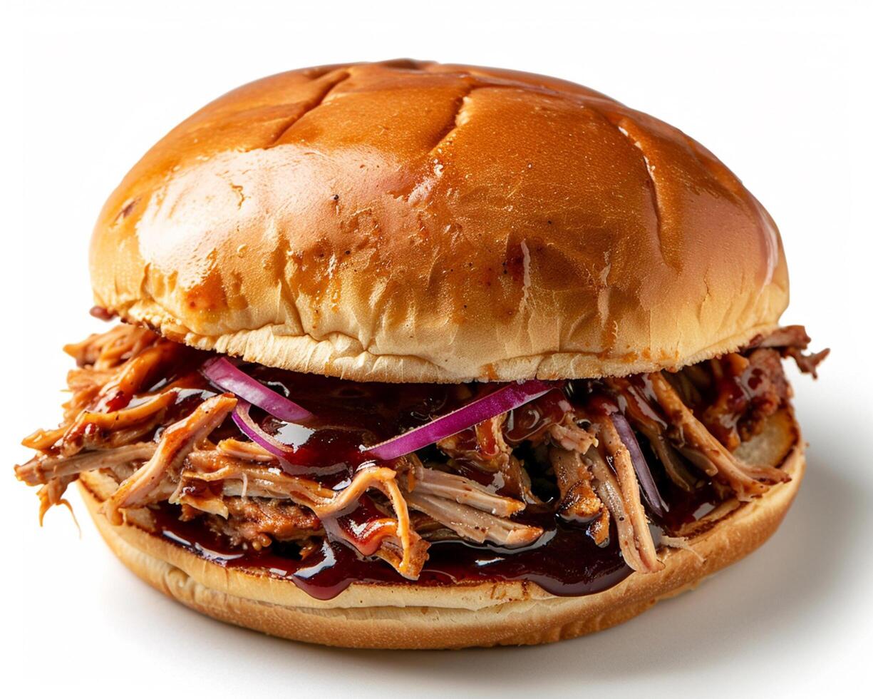 a pulled pork sandwich with bbq sauce on a white background photo