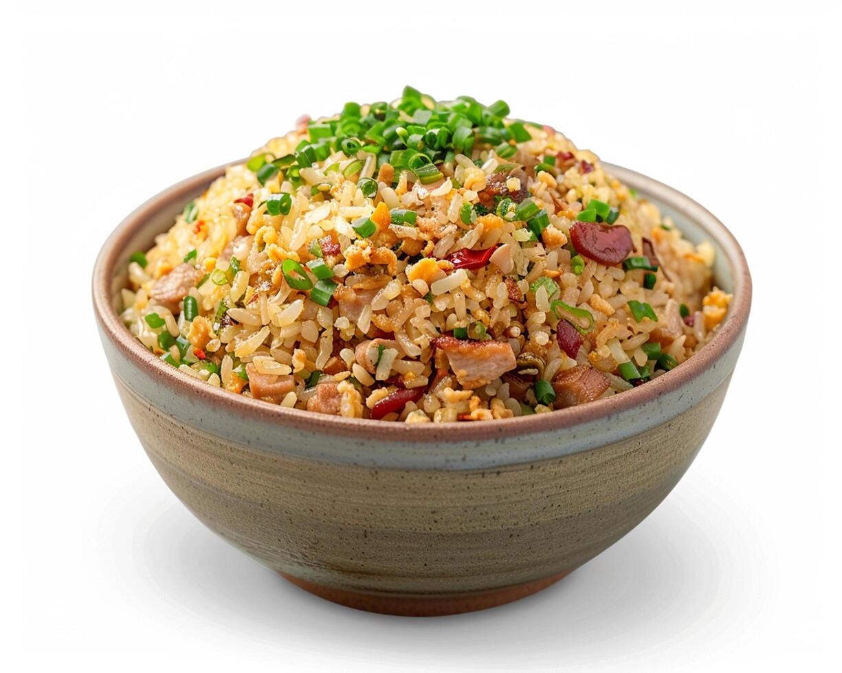 a bowl of fried rice with green onions photo