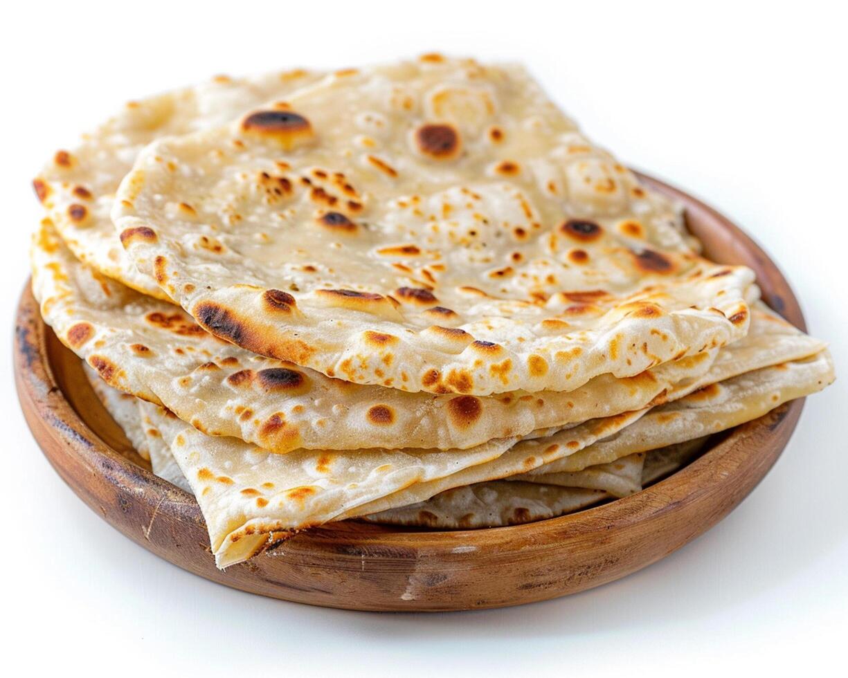 a bowl of flatbread on a white background photo