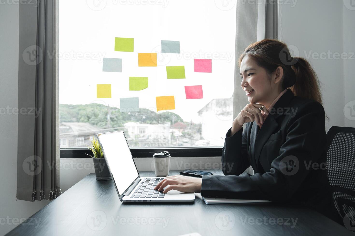 Accounting planning budget concept Business woman offices working for arranging documents unfinished stack of document papers with pen photo