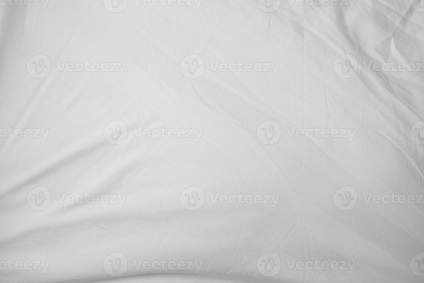 Abstract White Bedding Sheets or White wrinkled fabric background texture and Texture with copy space Creased photo