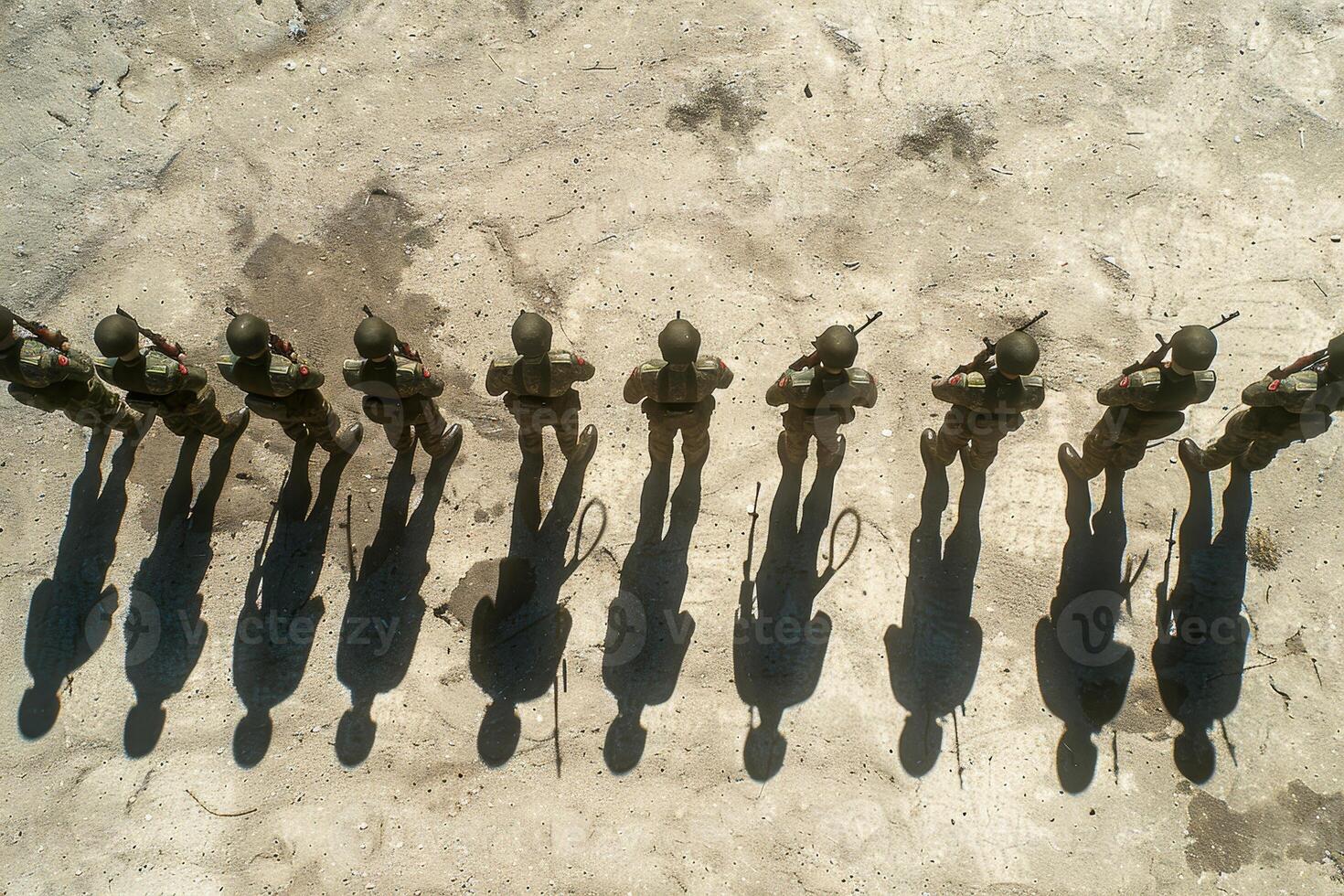 A group of men stand in a circle, with some of them wearing military uniforms photo