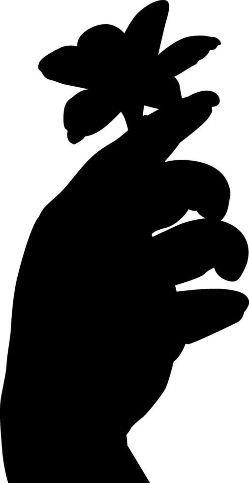 Silhouette hand holding flower vector