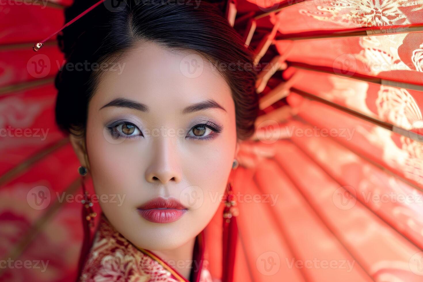 Elegant asian woman with traditional red umbrella photo