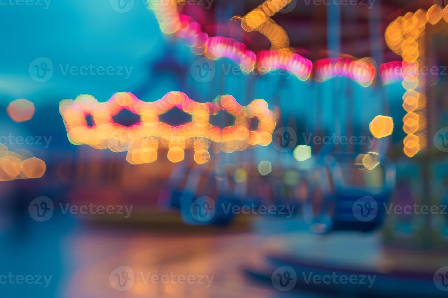 Abstract blurred lights on carousel background photo