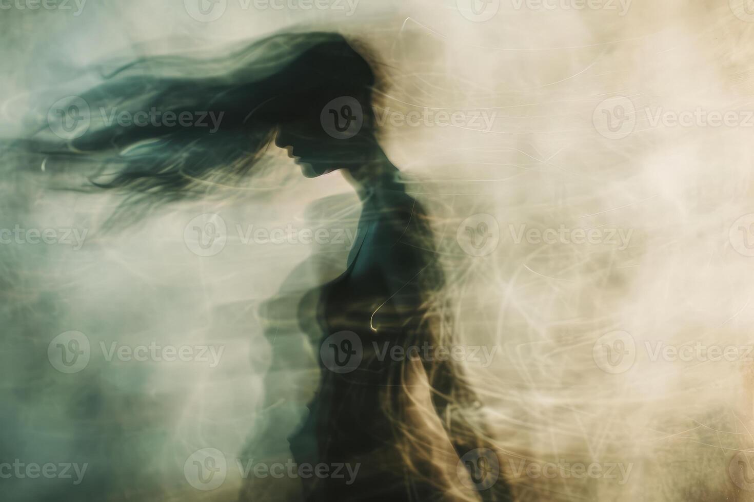 Ethereal woman in misty ambience photo