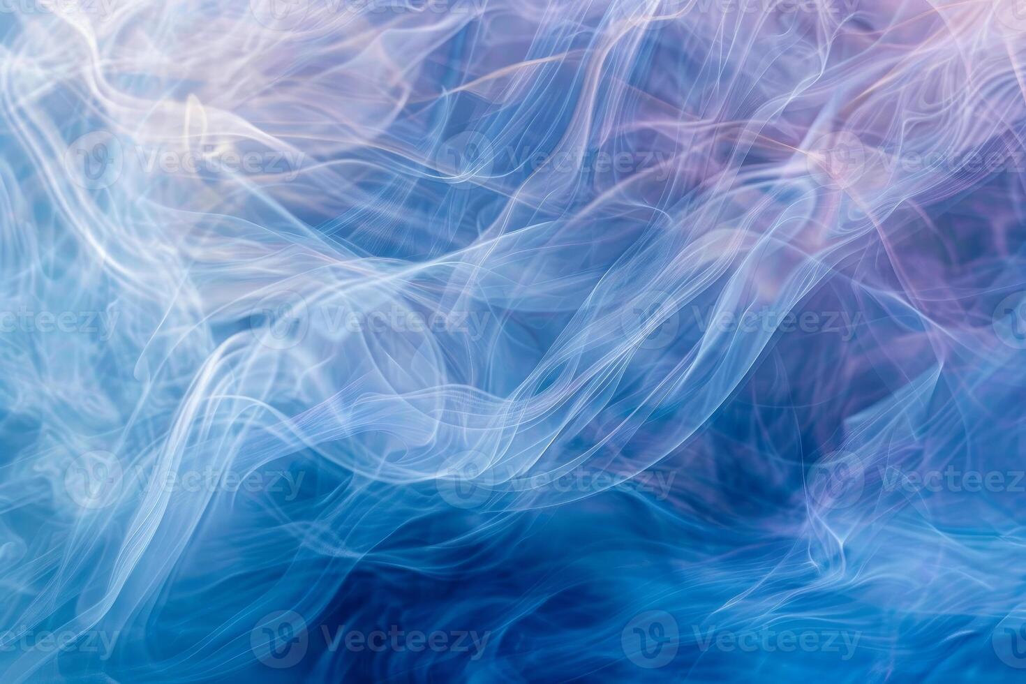 Ethereal blue and white smoke patterns for artistic and design use photo