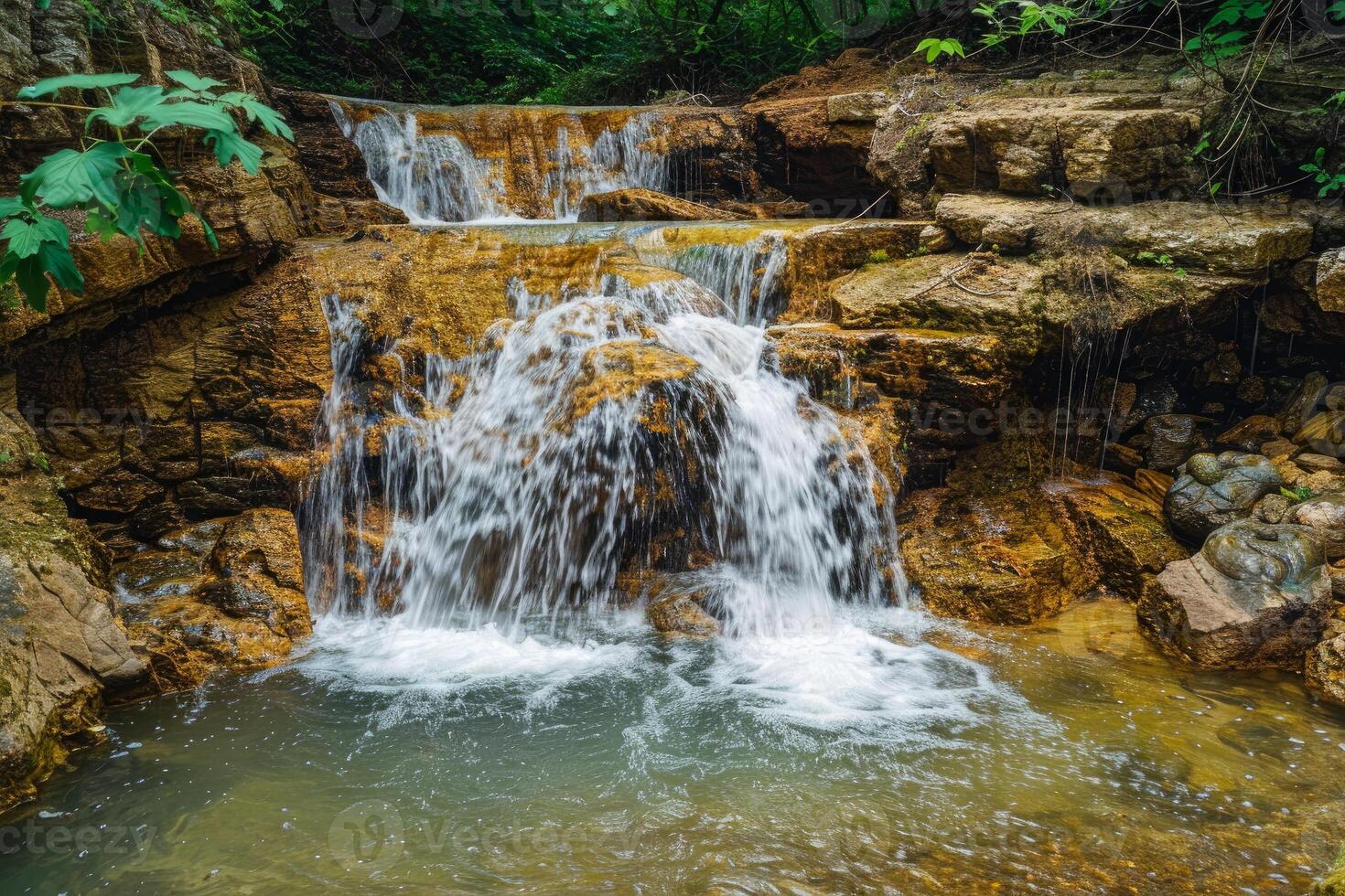 Serene cascade in lush forest photo
