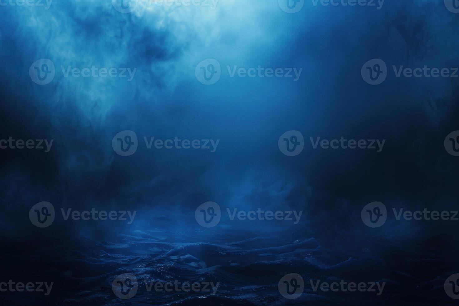Enigmatic dark blue smoke filling the space with a moody, atmospheric aura photo
