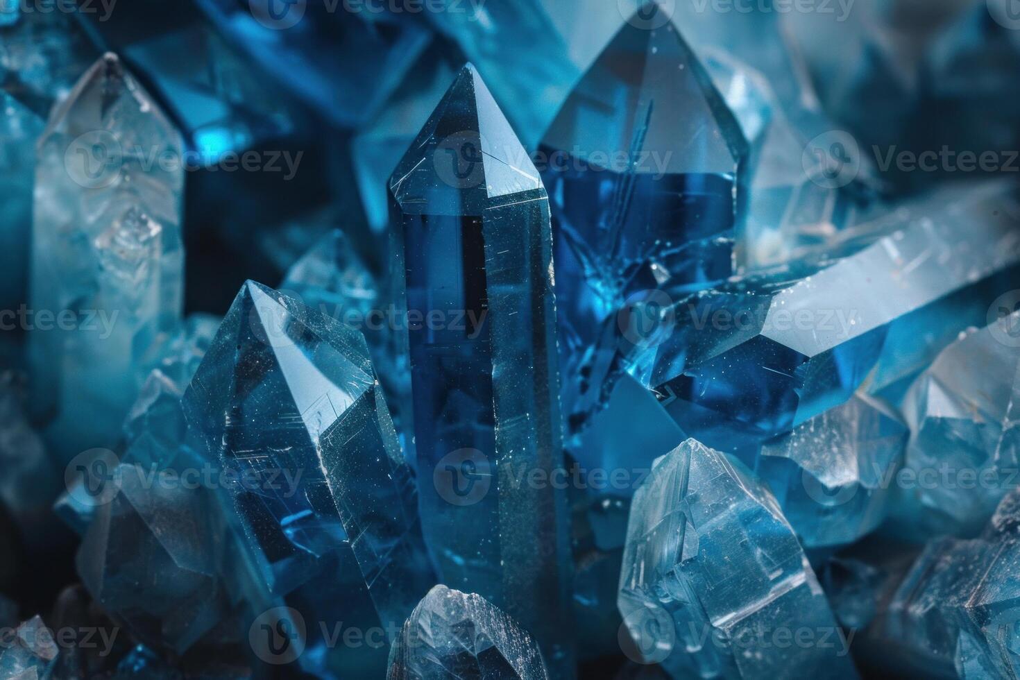 Macro close up of a group of pointing upwards aquamarine crystals photo
