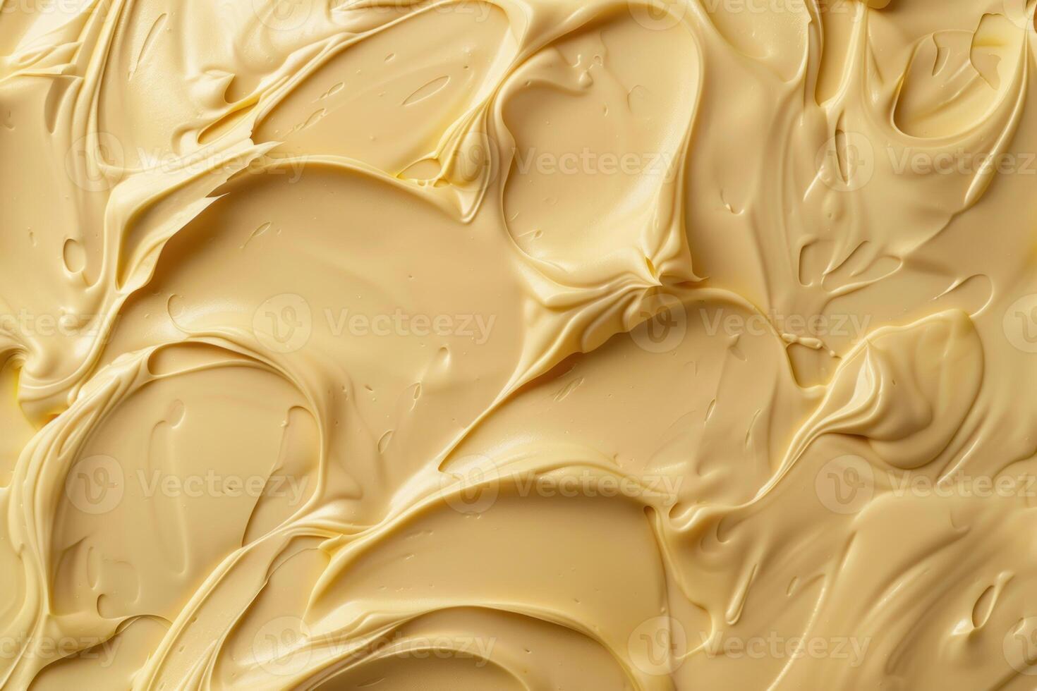 Closeup image of a smooth and creamy beige textured surface photo