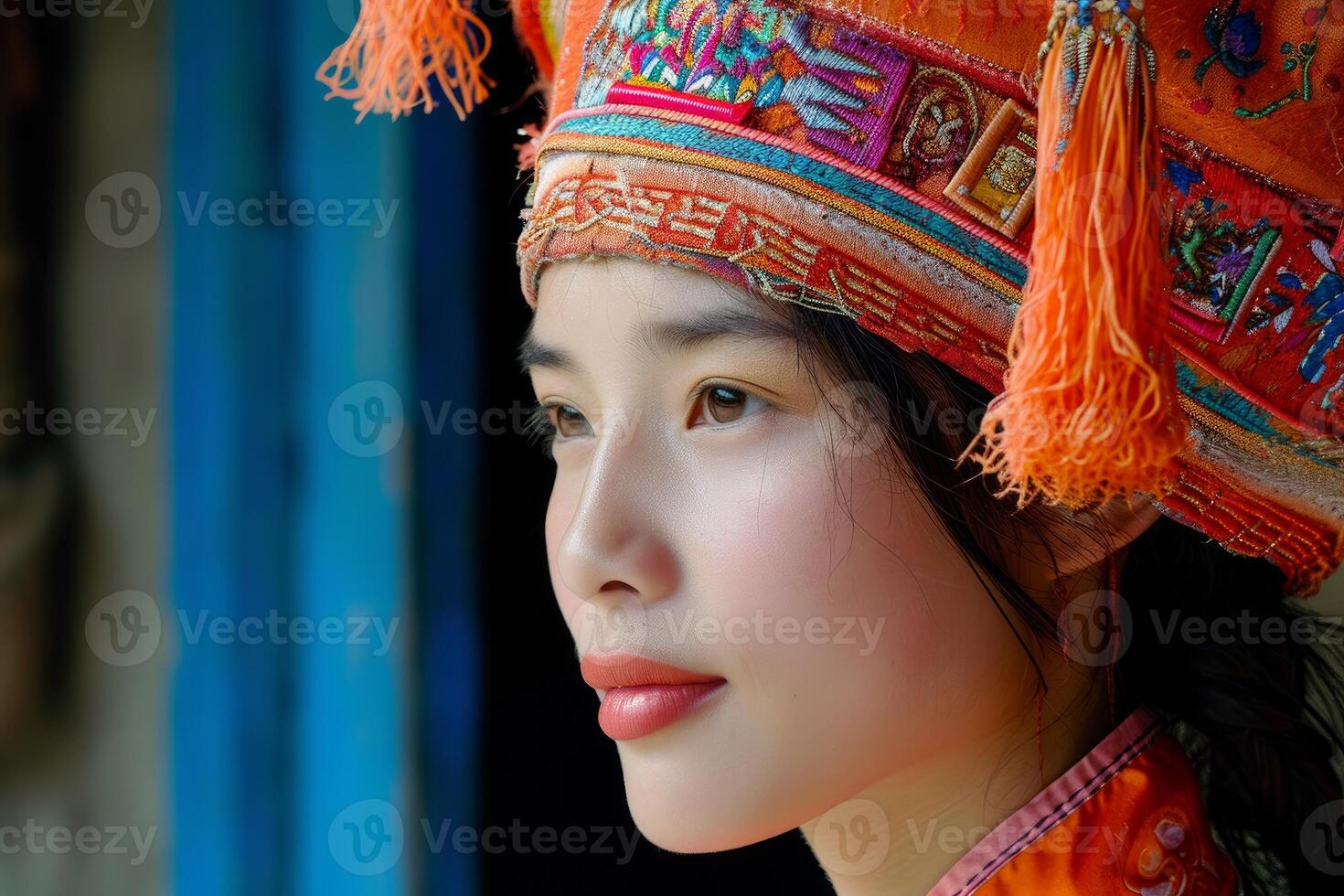 Portrait of a woman in traditional embroidered hat photo