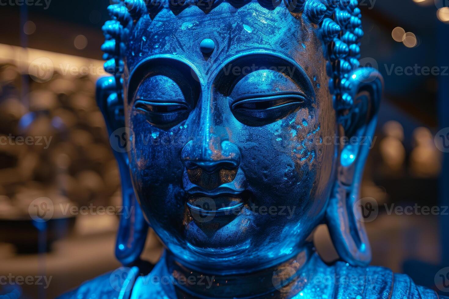 Serene blue buddha statue close-up photo