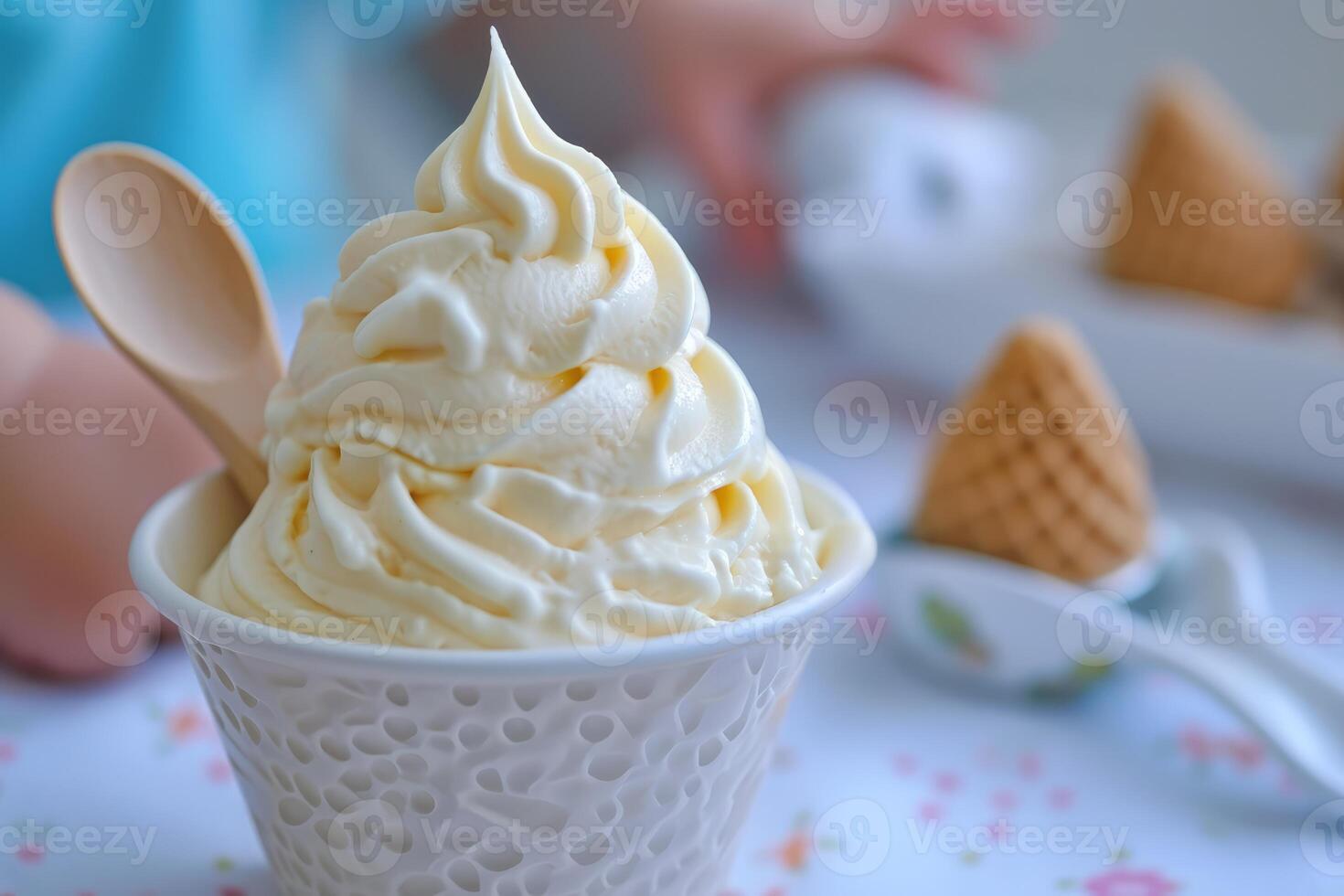 Whipped vanilla soft serve ice cream in a white bowl photo