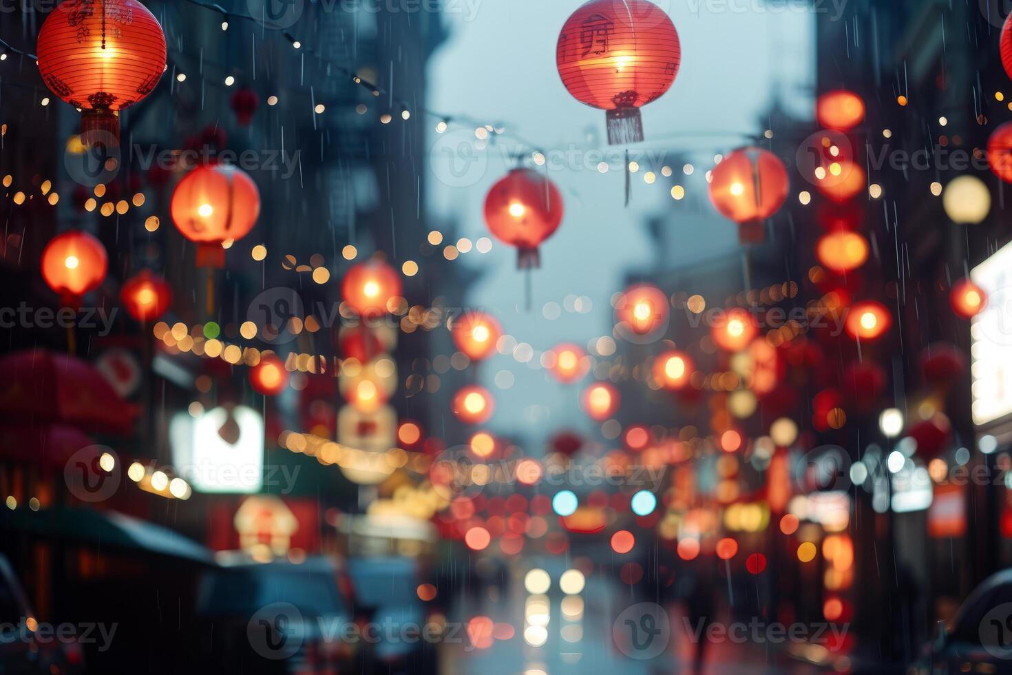 Festive lanterns illuminating rainy street scene photo