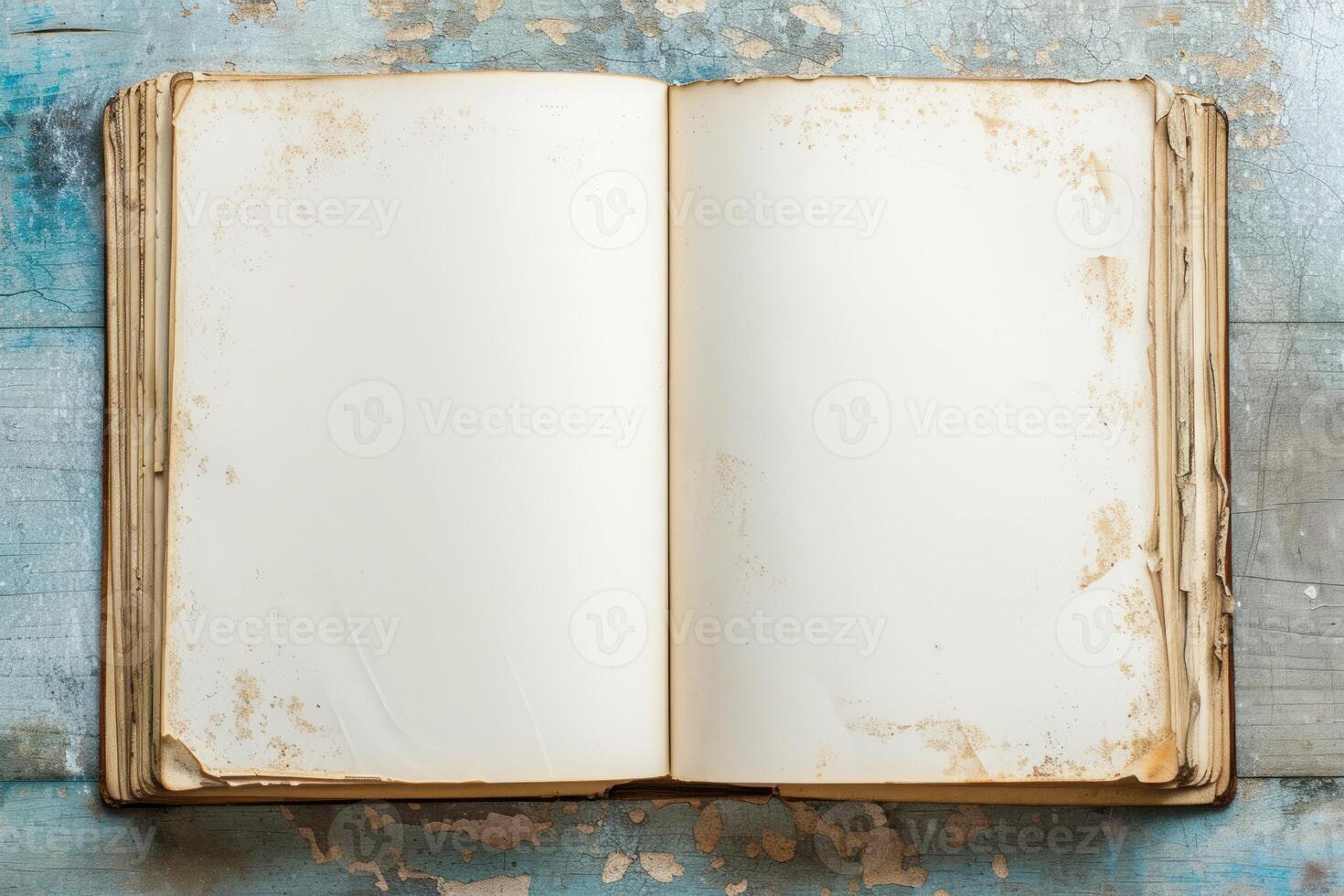 Vintage blank open book on rustic wooden background photo