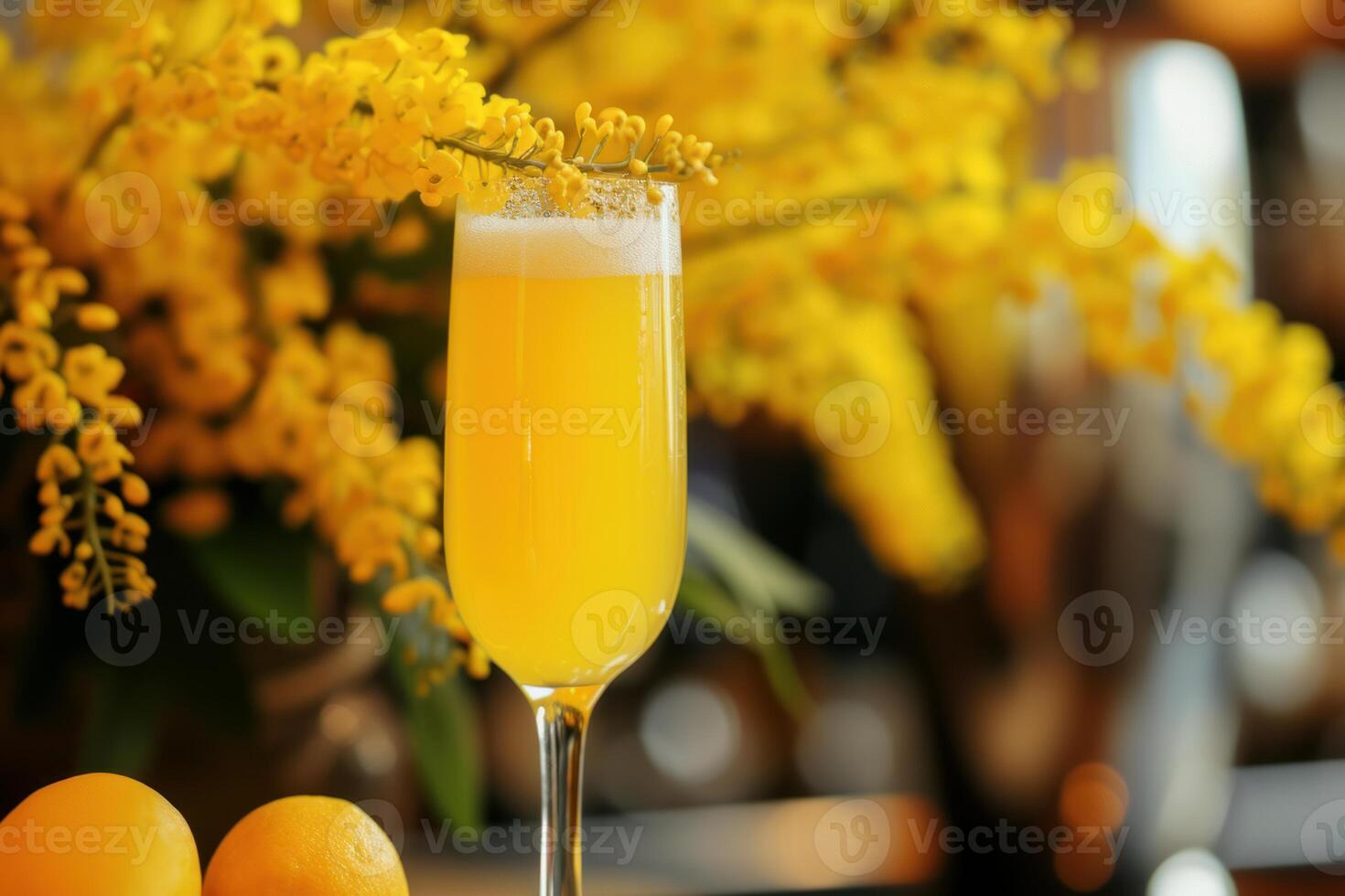 Refreshing mimosa cocktail with spring blooms photo
