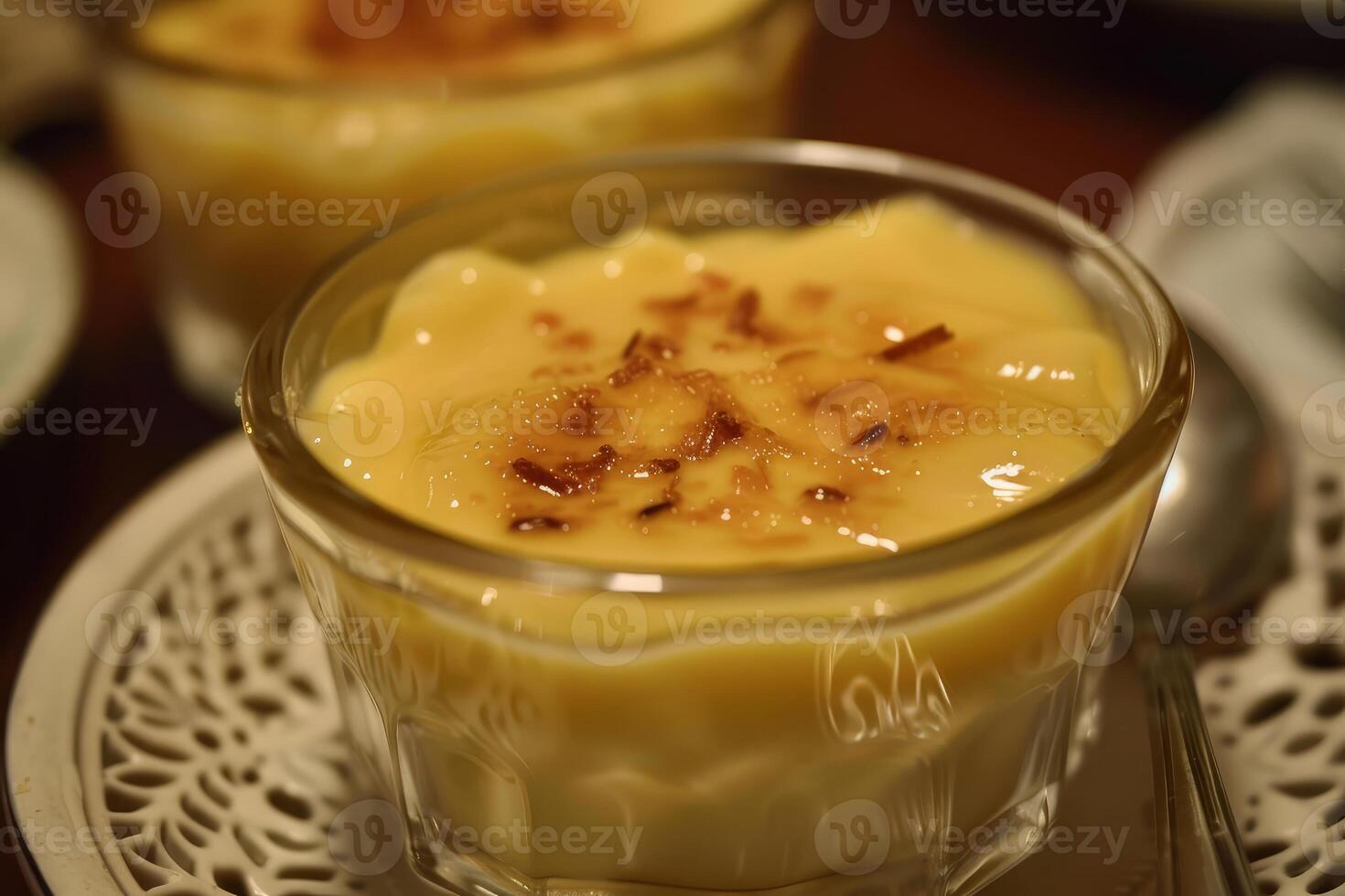 Creamy custard dessert in glass bowl photo