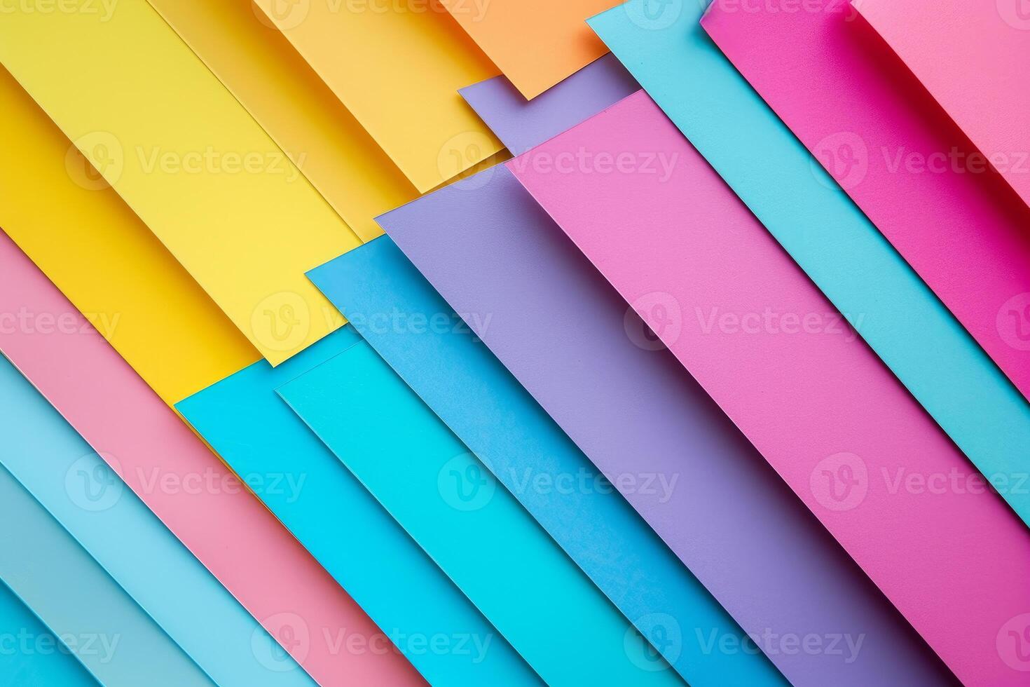 An assortment of vibrant colored paper organized in a diagonal layout photo