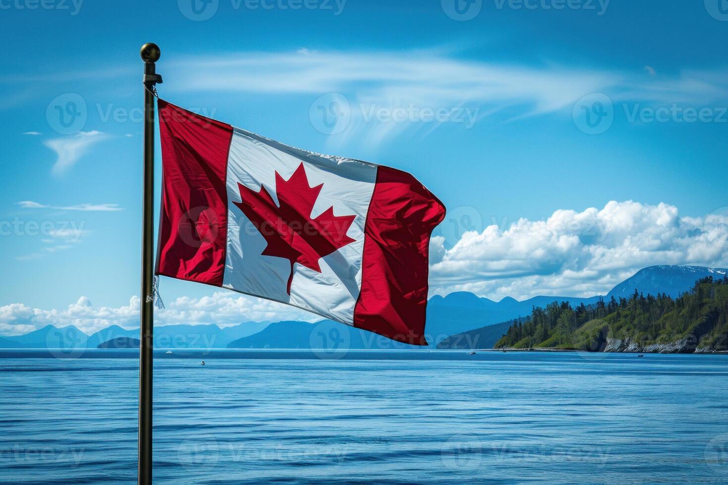 Canadian flag waving by the ocean photo