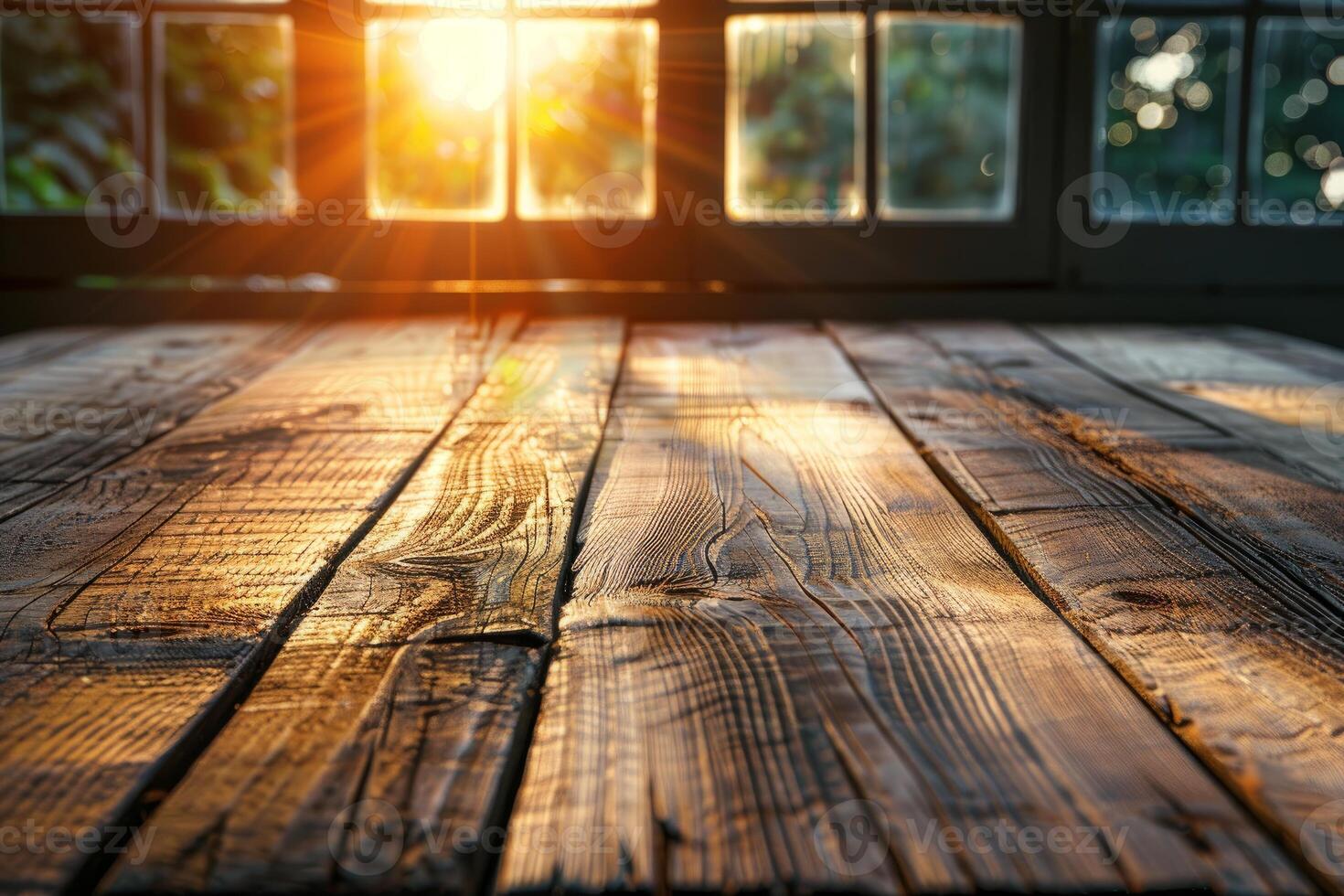 Warm sunset light streaming through window onto rustic wooden table photo