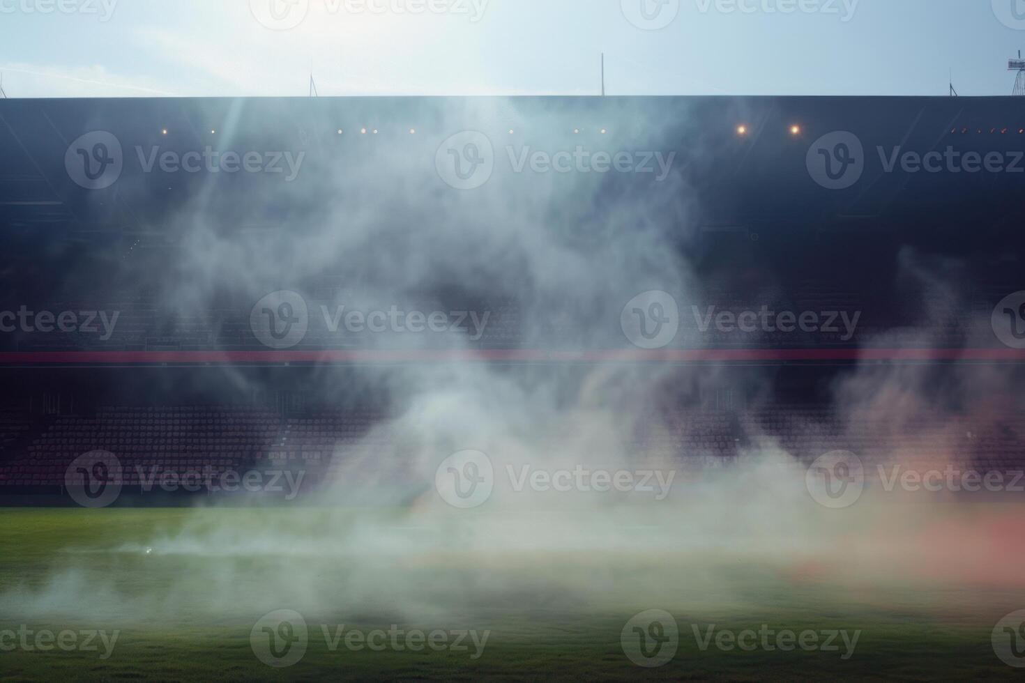 Misty football stadium field at dawn photo