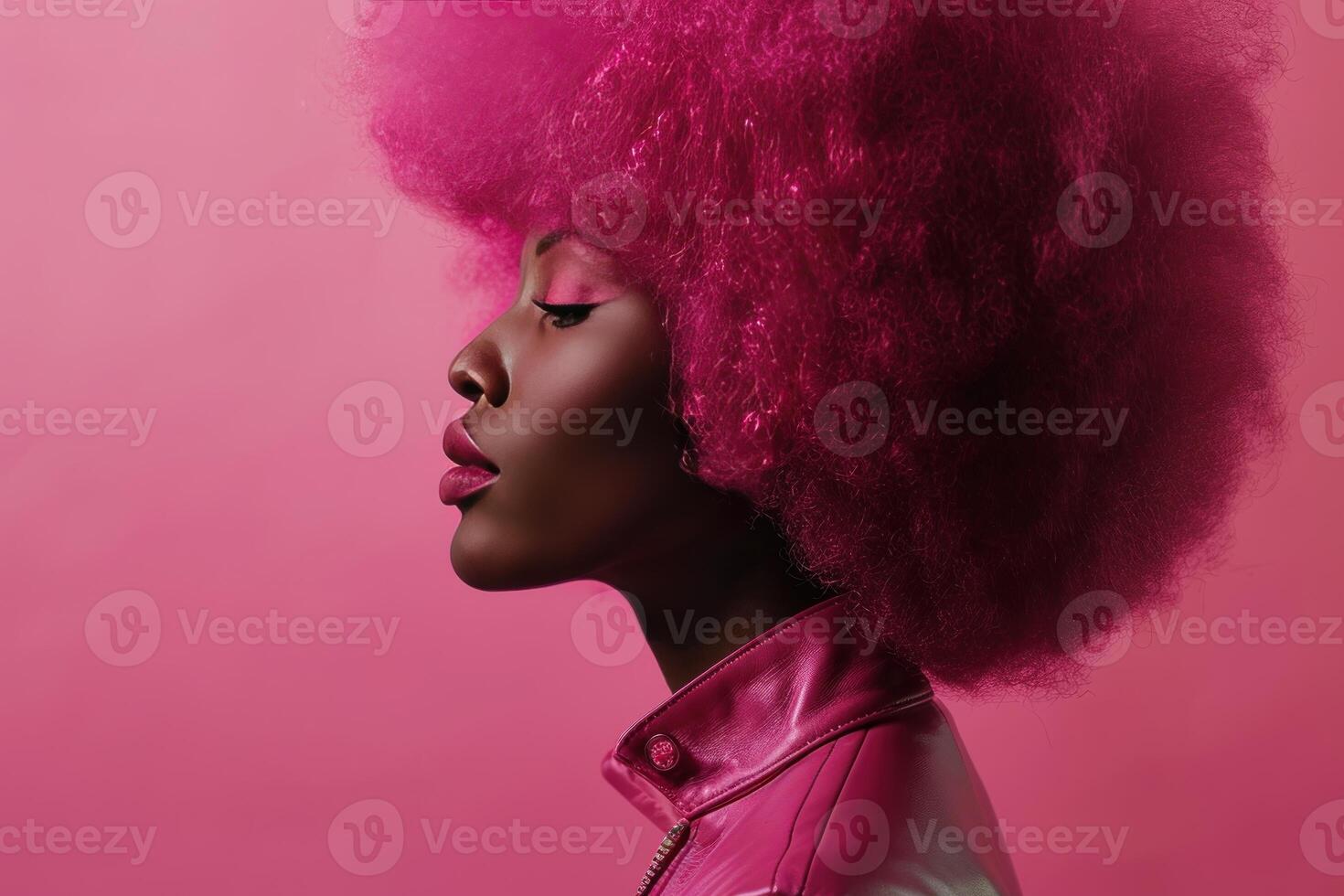Vibrant pink afro hairstyle on stunning model photo