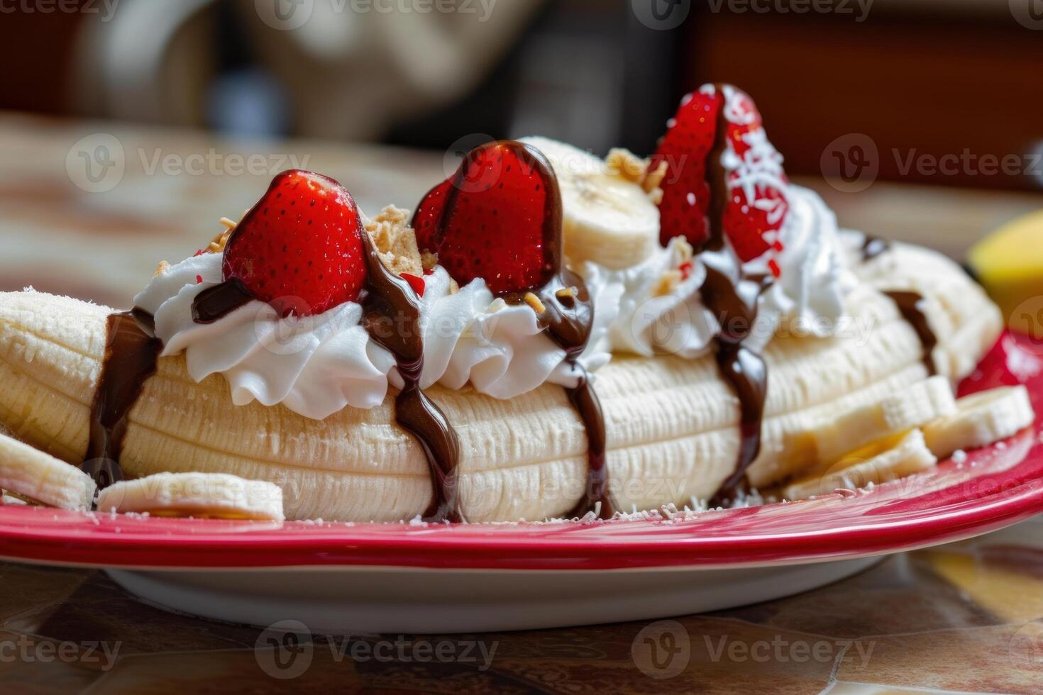 Delicious banana split dessert on plate photo